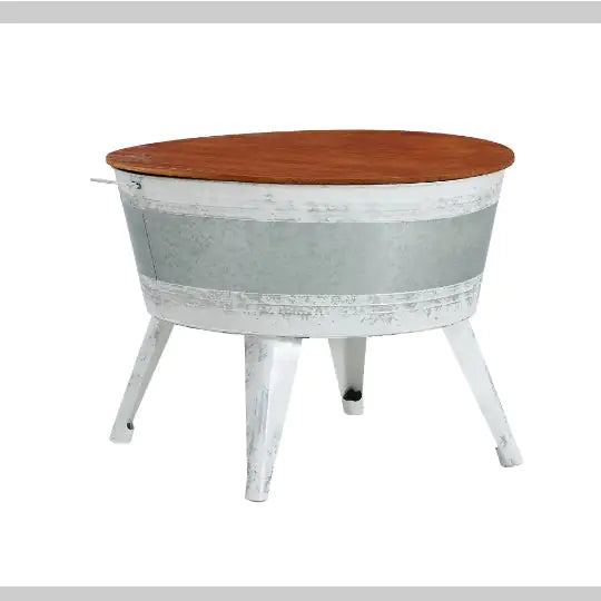 Rustic distressed metal accent table.