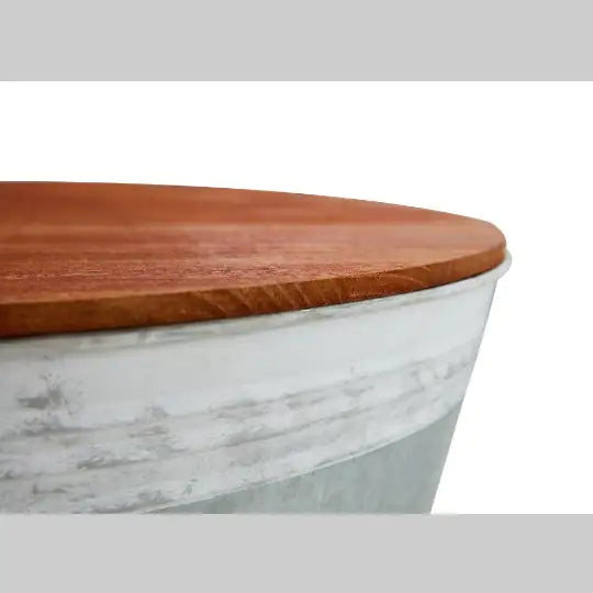 Rustic distressed metal accent table.