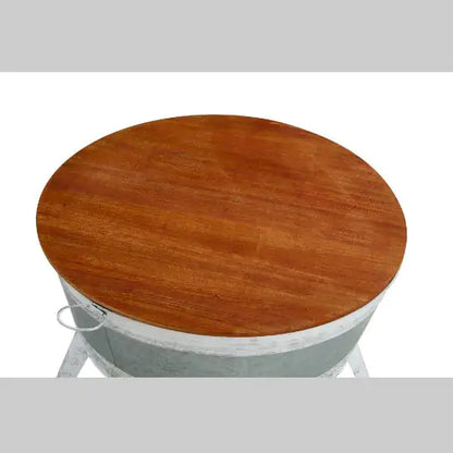 Rustic distressed metal accent table.