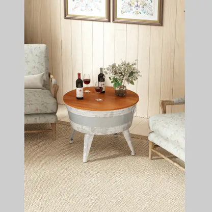 Rustic distressed metal accent table.